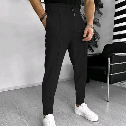Men s Casual Elastic Waist Drawstring Trousers with Pockets Solid Color Streetwear Pants for Everyday Comfort