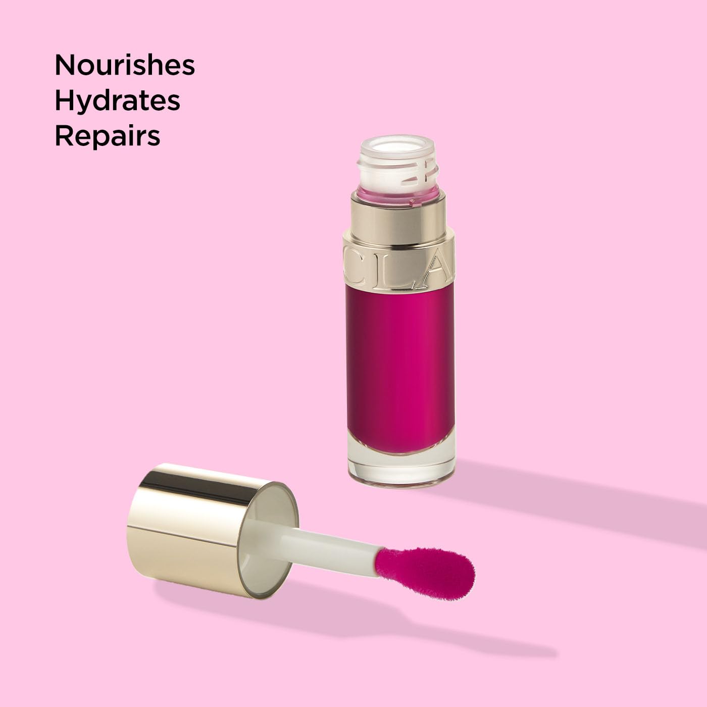 Clarins Lip Comfort Oil 7ml| Hydrating, Nourishing and Moisturising Lip Oil | Sheer, High Shine Finish | Soothes, Comforts and Protects Lips | Visibly Plumps | 93% Natural Ingredients