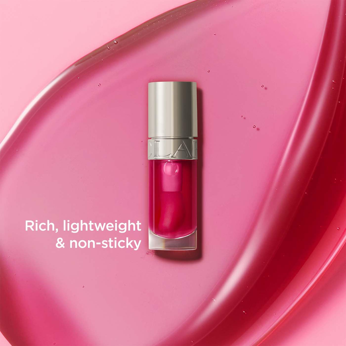Clarins Lip Comfort Oil 7ml| Hydrating, Nourishing and Moisturising Lip Oil | Sheer, High Shine Finish | Soothes, Comforts and Protects Lips | Visibly Plumps | 93% Natural Ingredients