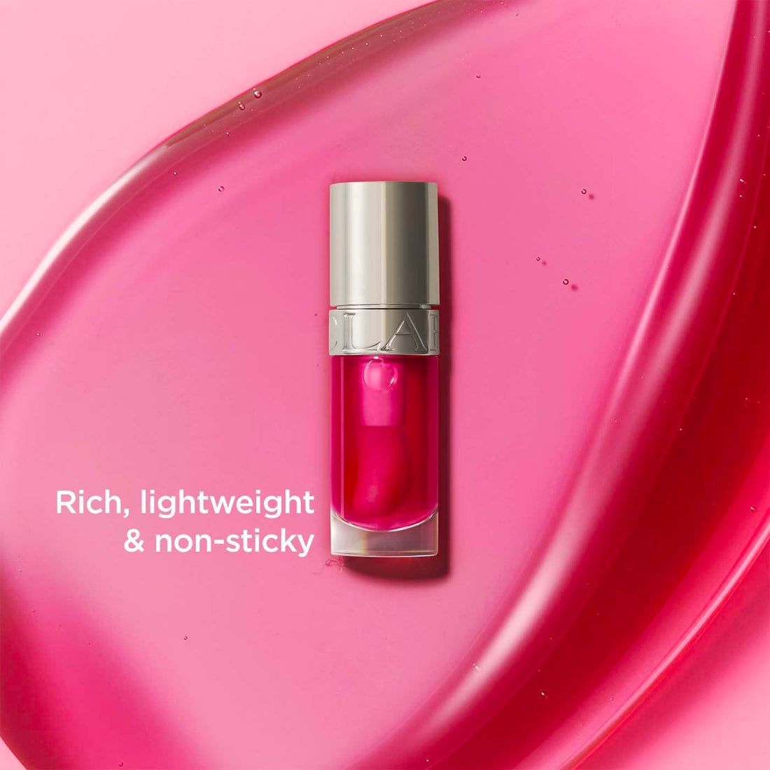 Clarins Lip Comfort Oil 7ml| Hydrating, Nourishing and Moisturising Lip Oil | Sheer, High Shine Finish | Soothes, Comforts and Protects Lips | Visibly Plumps | 93% Natural Ingredients