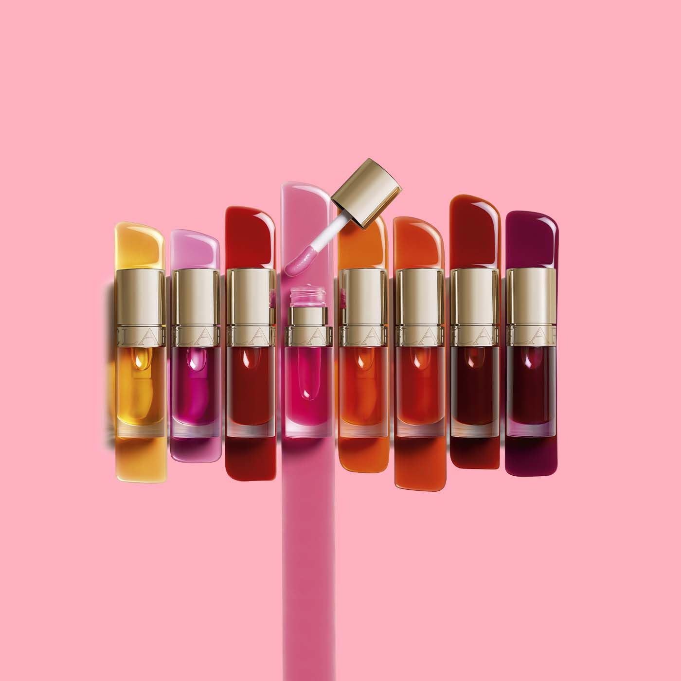 Clarins Lip Comfort Oil 7ml| Hydrating, Nourishing and Moisturising Lip Oil | Sheer, High Shine Finish | Soothes, Comforts and Protects Lips | Visibly Plumps | 93% Natural Ingredients