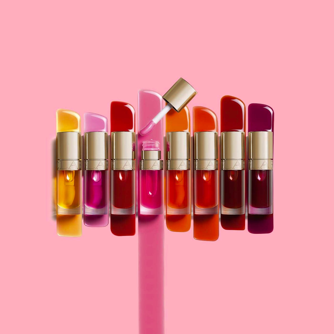Clarins Lip Comfort Oil 7ml| Hydrating, Nourishing and Moisturising Lip Oil | Sheer, High Shine Finish | Soothes, Comforts and Protects Lips | Visibly Plumps | 93% Natural Ingredients