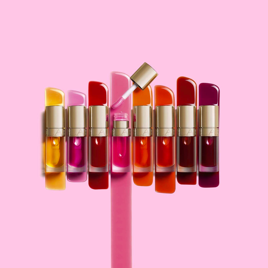 Clarins Lip Comfort Oil 7ml| Hydrating, Nourishing and Moisturising Lip Oil | Sheer, High Shine Finish | Soothes, Comforts and Protects Lips | Visibly Plumps | 93% Natural Ingredients