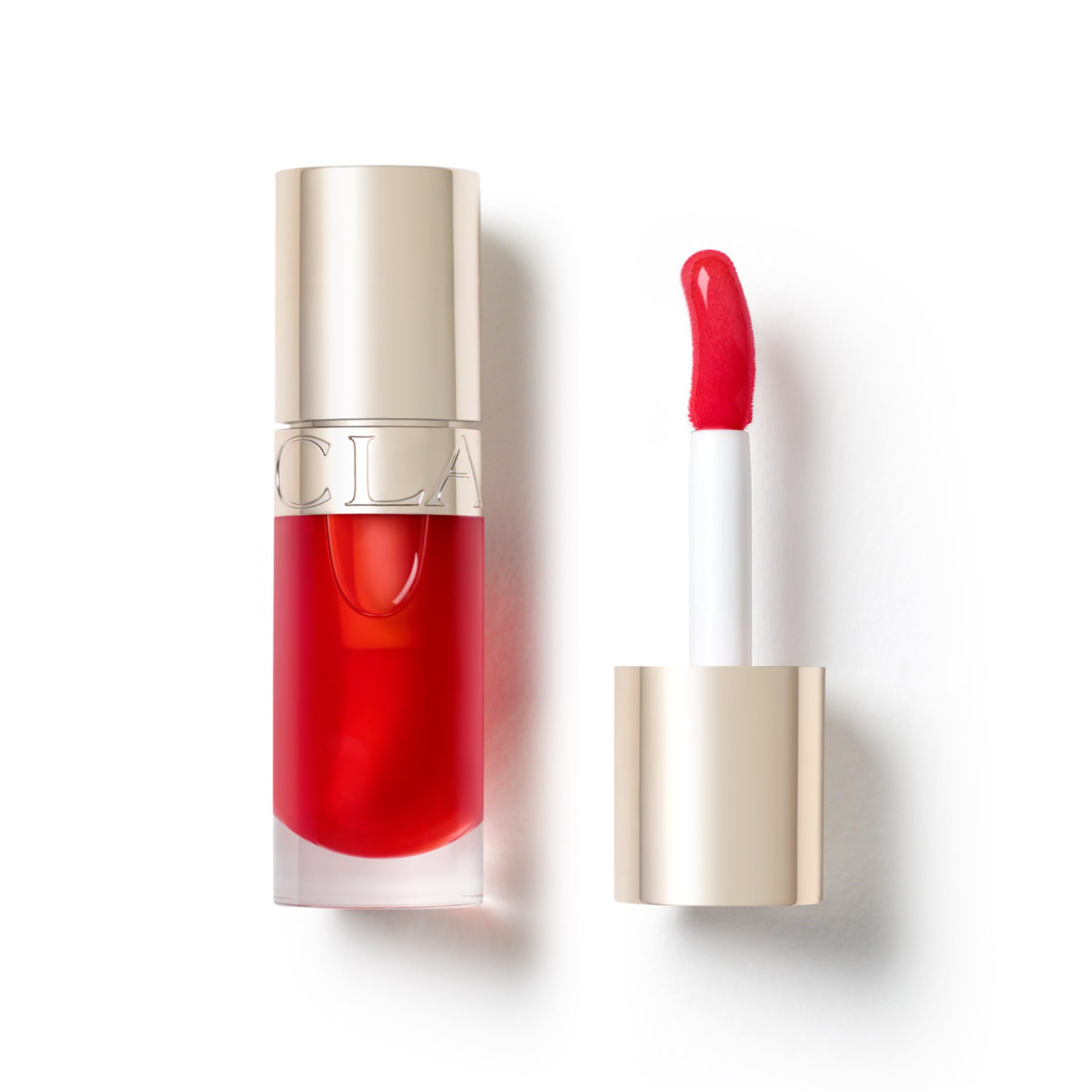 Clarins Lip Comfort Oil 7ml| Hydrating, Nourishing and Moisturising Lip Oil | Sheer, High Shine Finish | Soothes, Comforts and Protects Lips | Visibly Plumps | 93% Natural Ingredients