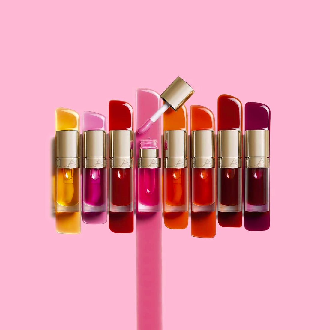 Clarins Lip Comfort Oil 7ml| Hydrating, Nourishing and Moisturising Lip Oil | Sheer, High Shine Finish | Soothes, Comforts and Protects Lips | Visibly Plumps | 93% Natural Ingredients