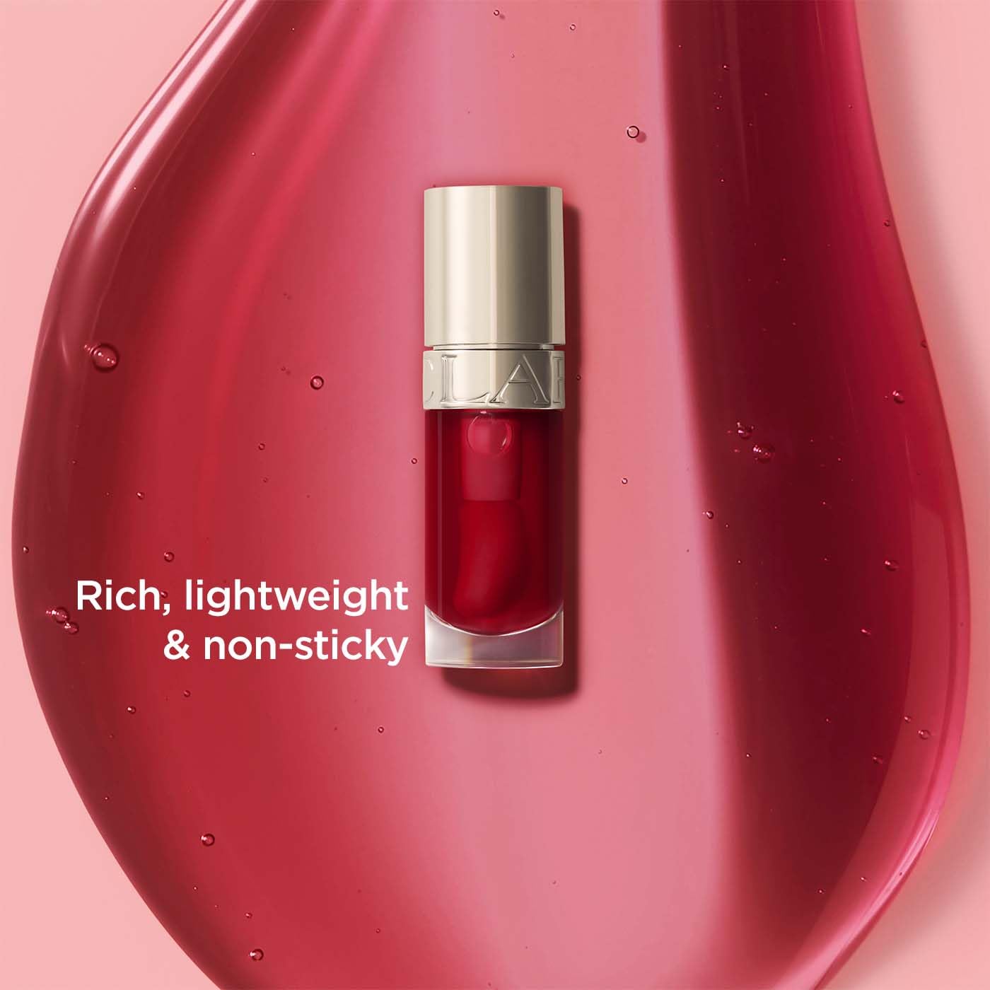 Clarins Lip Comfort Oil 7ml| Hydrating, Nourishing and Moisturising Lip Oil | Sheer, High Shine Finish | Soothes, Comforts and Protects Lips | Visibly Plumps | 93% Natural Ingredients