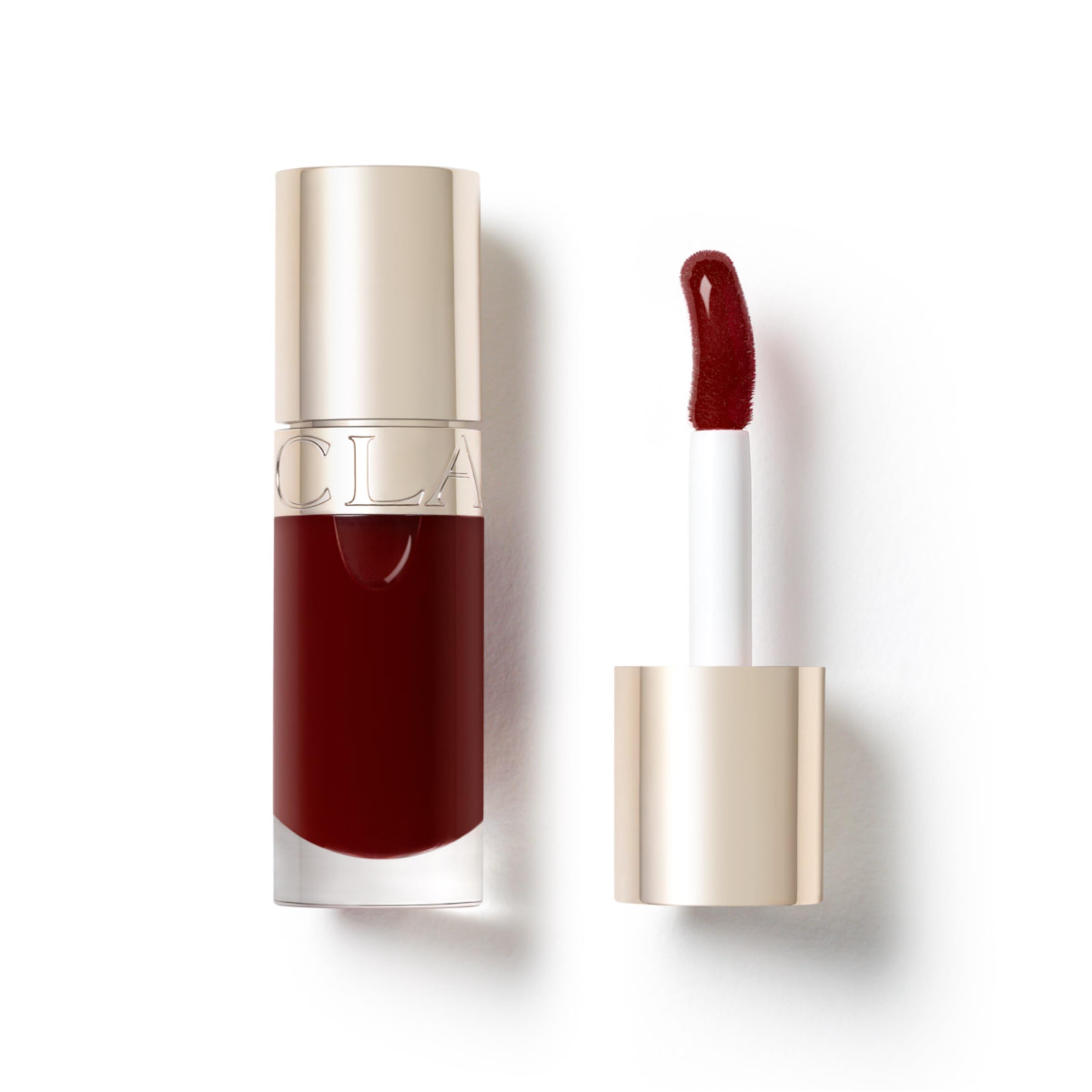 Clarins Lip Comfort Oil 7ml| Hydrating, Nourishing and Moisturising Lip Oil | Sheer, High Shine Finish | Soothes, Comforts and Protects Lips | Visibly Plumps | 93% Natural Ingredients