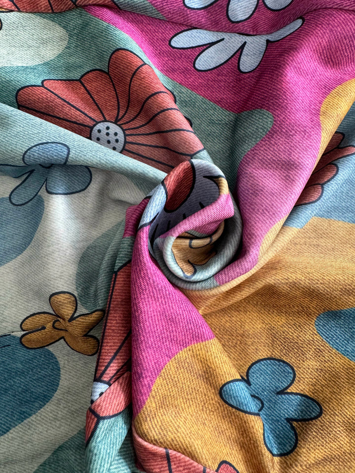 Dünne, ausgestellte Schlaghose aus Denim-Imitat für Damen in großen Größen mit Sonnenblumen- und Gänseblümchenmuster, elastischem Gürtel und schrägen Pattentaschen – bequem und modisch zu jeder Jahreszeit.