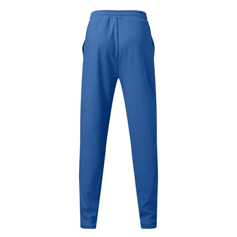 Men s Casual Elastic Waist Drawstring Trousers with Pockets Solid Color Streetwear Pants for Everyday Comfort