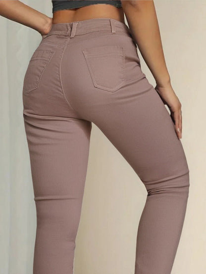 Pink women's plus-size jeans, stretchy skinny denim pants that fit comfortably against the skin and resist deformation