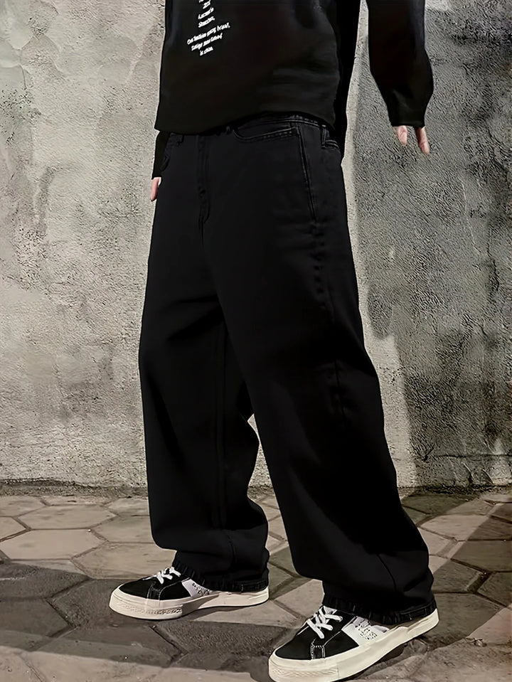 Jeans neri da uomo a gamba larga, larghi e fluidi, semplici e versatili, per creare facilmente uno stile di strada e un look casual quotidiano.